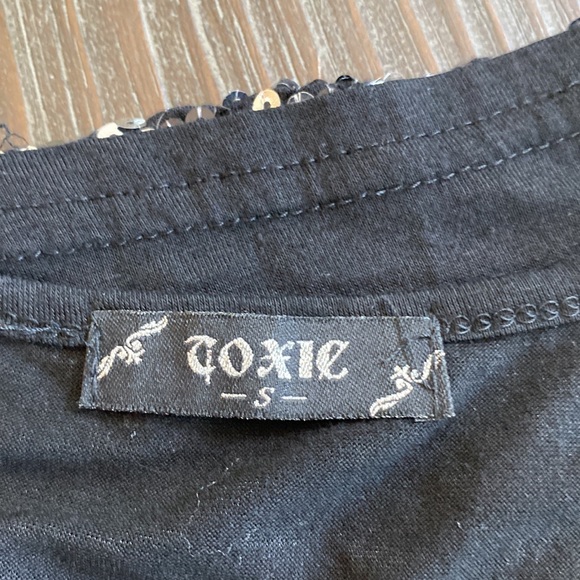 3/$20. Three tank tops sizes extra small, small and medium. - Picture 4 of 13